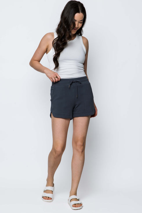 Luxe fleece dark grey athletic shorts with a curved hem