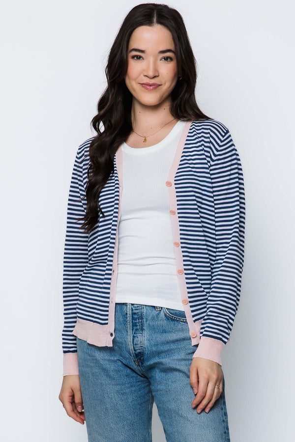 Woman wearing a striped cardigan, on a white background