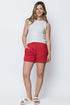 Red luxe fleece athletic shorts with curved hem.